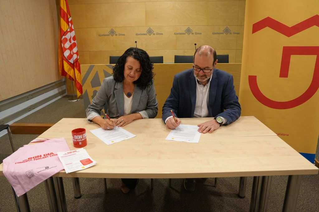 Convenio entre el Ayuntamiento de Girona y Plataforma per la Llengua para Promover el Uso del Catalán en el Comercio